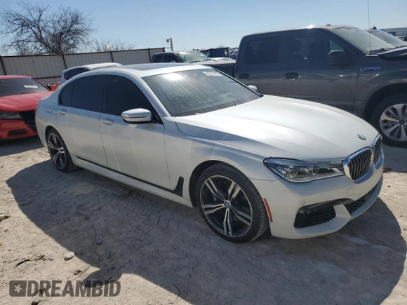 2019 BMW 7 Series 750i with VIN WBA7F0C5XKGM25348, listed as a Copart auction lot 46537485 with 54,365 mi miles and Salvage title. Bid and sale history available at DreamBid. Image 4.