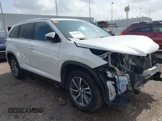 2019 Toyota Highlander SE with VIN 5TDKZRFH0KS557636, listed as a IAAI auction lot 42601100 with 107,922 mi miles and . Bid and sale history available at DreamBid. Image 1.