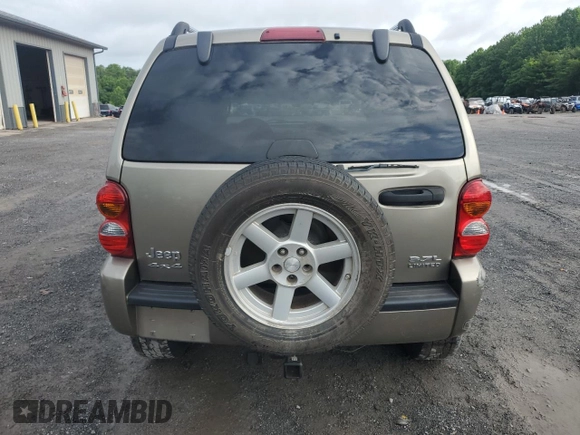 2006 Jeep Liberty Limited z VIN 1J4GL58K96W237675, wystawiony jako Copart lot #61155635 z przebiegiem 121 285 mil mil oraz Szkoda całkowita • Salvage title. Historia ofert i sprzedaży dostępna na DreamBid. Obrazek 6.
