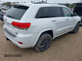 2014 Jeep Grand Cherokee Overland with VIN 1C4RJECG4EC543092, listed as a IAAI auction lot 40981315 with 149,096 mi miles. Bid and sale history available at carsss.com. Image 4.