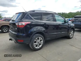 2017 Ford Escape SE z VIN 1FMCU0G93HUF10560, wystawiony jako Copart lot #57973915 z przebiegiem 127 444 mil mil oraz Czysty tytuł • Clean title. Historia ofert i sprzedaży dostępna na DreamBid. Obrazek 3.