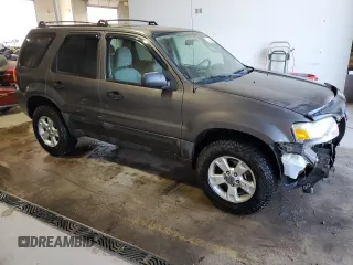 2006 Ford Escape XLT with VIN 1FMYU93136KB47339, listed as a Copart auction lot 77029434 with 76,101 mi miles and Salvage Title. Bid and sale history available at carsss.com. Image 4.