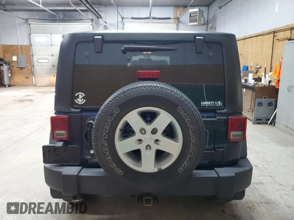 2013 Jeep Wrangler Sport with VIN 1C4AJWAG4DL501929, listed as a Copart auction lot 61940245 with 85,345 mi miles and Clean title. Bid and sale history available at DreamBid. Image 6.
