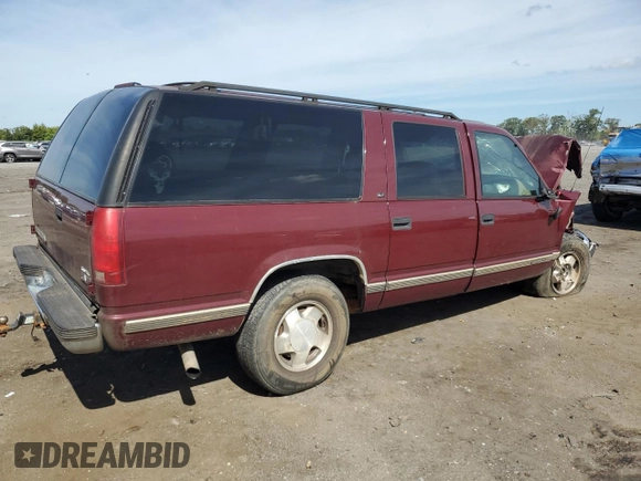1998 GMC Suburban z VIN 3GKFK16R1WG503206, wystawiony jako Copart lot #69802344 z przebiegiem 231 148 mil mil oraz Szkody całkowita. Historia ofert i sprzedaży dostępna na DreamBid. Obrazek 3.