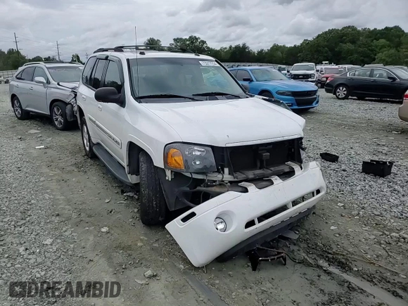 2005 GMC Envoy SLT with VIN 1GKDS13S652330496, listed as a Copart auction lot 73317234 with 191,138 mi miles and Salvage Title. Bid and sale history available at DreamBid. Image 12.