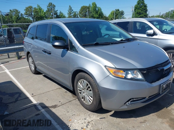 2016 Honda Odyssey LX z VIN 5FNRL5H22GB092614, wystawiony jako IAAI lot #42173633 z przebiegiem 159 387 mil mil oraz . Historia ofert i sprzedaży dostępna na DreamBid. Obrazek 1.