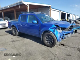 2015 Nissan Frontier Pro-4X with VIN 1N6AD0EV2FN736394, listed as a Copart auction lot 53916455 with 116,801 mi miles and Salvage title. Bid and sale history available at DreamBid. Image 4.