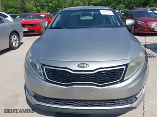 2013 Kia Optima Hybrid EX with VIN KNAGM4AD8D5059623, listed as a IAAI auction lot 42052998 with 135,051 mi miles. Bid and sale history available at carsss.com. Image 6.