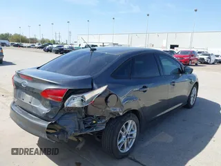 2018 Ford Focus SE with VIN 1FADP3F2XJL302358, listed as a IAAI auction lot 41807622 with 76,145 mi miles. Bid and sale history available at carsss.com. Image 4.