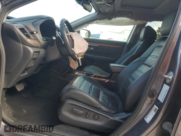2020 Honda CR-V Touring with VIN 2HKRW2H96LH677520, listed as a Copart auction lot 52264155 with 33,909 mi miles and Salvage Title. Bid and sale history available at DreamBid. Image 7.