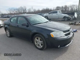 2009 Dodge Avenger SXT with VIN 1B3LC56B49N570157, listed as a IAAI auction lot 41796122 with 164,571 mi miles. Bid and sale history available at carsss.com. Image 1.