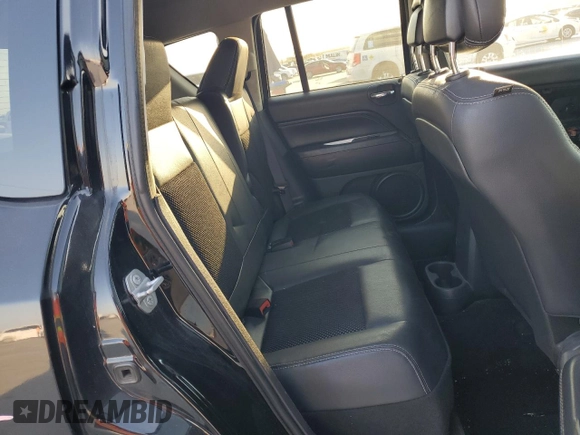2015 Jeep Compass Latitude with VIN 1C4NJCEBXFD131484, listed as a Copart auction lot 74731464 with 76,048 mi miles and Salvage Title. Bid and sale history available at carsss.com. Image 11.