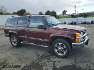 1995 Chevrolet Tahoe with VIN 1GNEK13K9SJ445554, listed as a Copart auction lot 50945835 with 206,626 mi miles and Salvage Title. Bid and sale history available at carsss.com. Image 4.