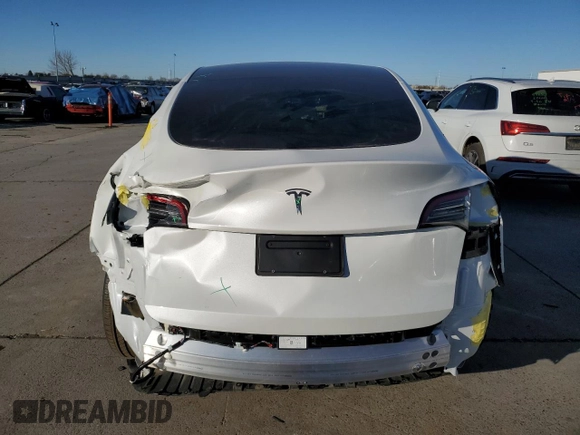 2025 Tesla Model Y Long Range with VIN 7SAYGDEDXSF228371, listed as a Copart auction lot 43925575 with 2,848 mi miles and Salvage Title. Bid and sale history available at DreamBid. Image 6.