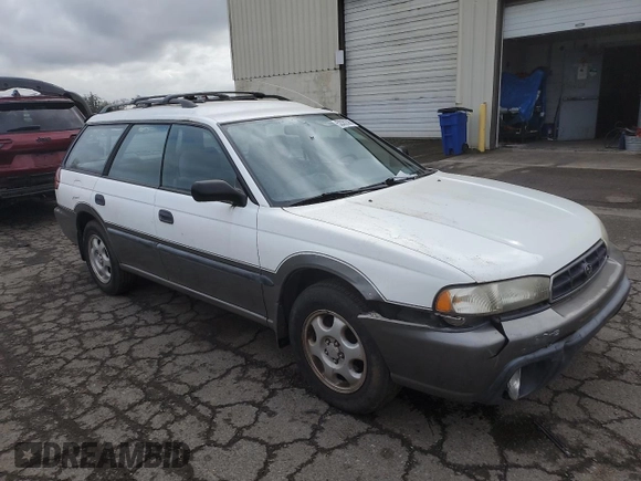 1996 Subaru Legacy Outback with VIN 4S3BG6850T7971454, listed as a Copart auction lot 52082395 with 173,542 mi miles and Salvage title. Bid and sale history available at DreamBid. Image 4.