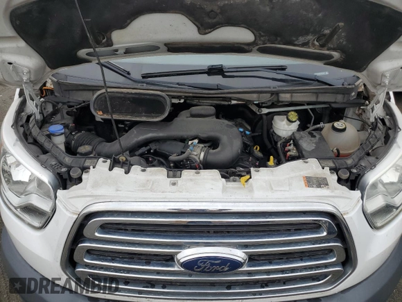 2015 Ford Transit Cargo with VIN 1FTYE1CM7FKA24477, listed as a Copart auction lot 86310214 with 54,098 mi miles and Salvage title. Bid and sale history available at DreamBid. Image 12.