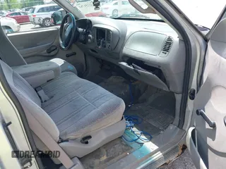 1998 Ford F-150 with VIN 1FTZX1767WNB79135, listed as a IAAI auction lot 42251761 with 221,839 mi miles and . Bid and sale history available at DreamBid. Image 5.