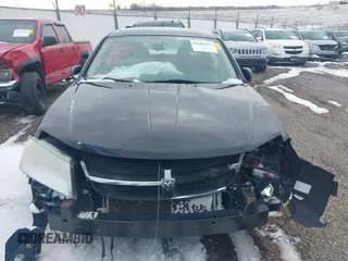 2010 Dodge Avenger R/T with VIN 1B3CC5FB0AN129498, listed as a IAAI auction lot 41626357 with 182,104 mi miles. Bid and sale history available at carsss.com. Image 12.