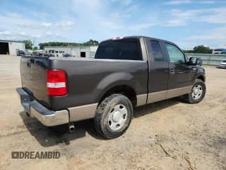 2005 Ford F-150 XLT with VIN 1FTRX12565KB21614, listed as a Copart auction lot 61488075 with 202,747 mi miles and Salvage title. Bid and sale history available at DreamBid. Image 3.