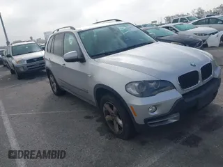 2009 BMW X5 30i with VIN 5UXFE43559L263976, listed as a IAAI auction lot 41813156 with 137,006 mi miles. Bid and sale history available at carsss.com. Image 1.