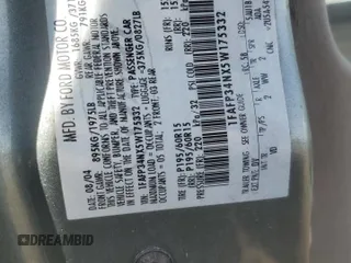 2005 Ford Focus S with VIN 1FAFP34NX5W175332, listed as a Copart auction lot 49306815 with 146,290 mi miles and Salvage Title. Bid and sale history available at carsss.com. Image 14.