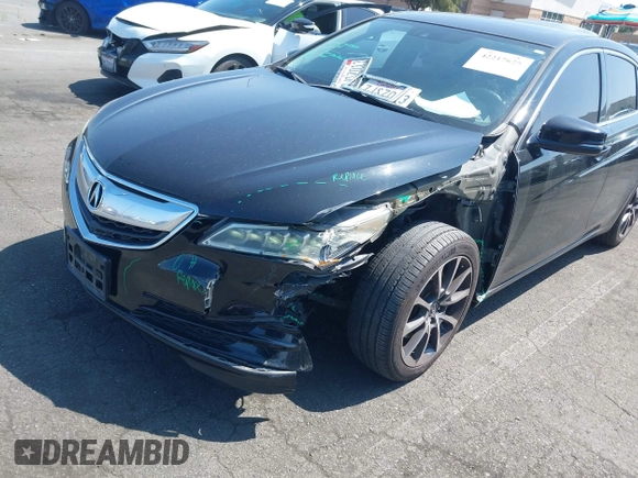 2015 Acura TLX Technology z VIN 19UUB2F51FA014827, wystawiony jako IAAI lot #42217625 z przebiegiem 104 159 mil mil oraz . Historia ofert i sprzedaży dostępna na DreamBid. Obrazek 6.