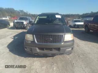 2004 Ford Expedition XLT with VIN 1FMPU16W64LA01397, listed as a IAAI auction lot 41494738 with 214,192 mi miles. Bid and sale history available at carsss.com. Image 6.