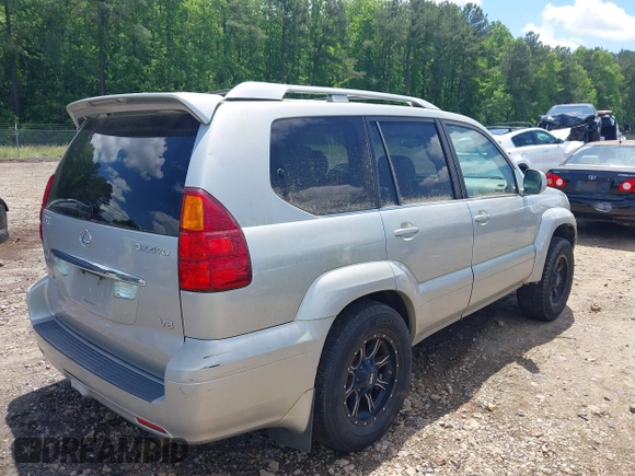 2004 Lexus GX 470 with VIN JTJBT20X640035217, listed as a IAAI auction lot 42156303 with 310,711 mi miles and . Bid and sale history available at DreamBid. Image 4.