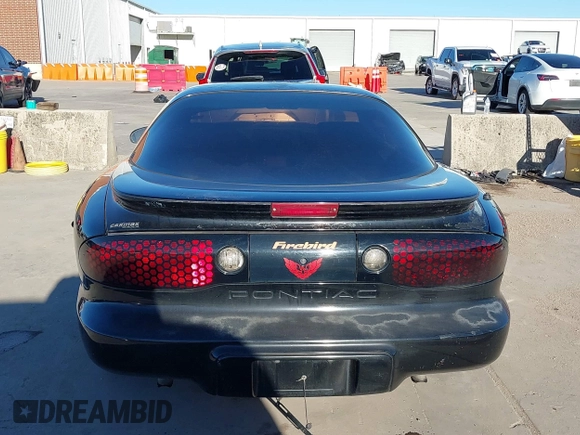 2002 Pontiac Firebird Firebird z VIN 2G2FS22K022109417, wystawiony jako IAAI lot #41199057 z przebiegiem 124 463 mil mil oraz . Historia ofert i sprzedaży dostępna na DreamBid. Obrazek 16.