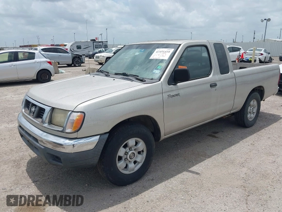 1999 Nissan Frontier XE with VIN 1N6DD26S0XC317003, listed as a IAAI auction lot 42451418 with 246,667 mi miles and . Bid and sale history available at DreamBid. Image 2.