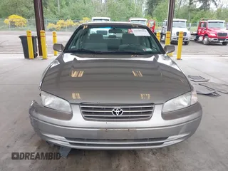 1998 Toyota Camry LE z VIN JT2BG22KXW0157647, wystawiony jako IAAI lot #42282818 z przebiegiem 267 681 mil mil oraz . Historia ofert i sprzedaży dostępna na DreamBid. Obrazek 12.