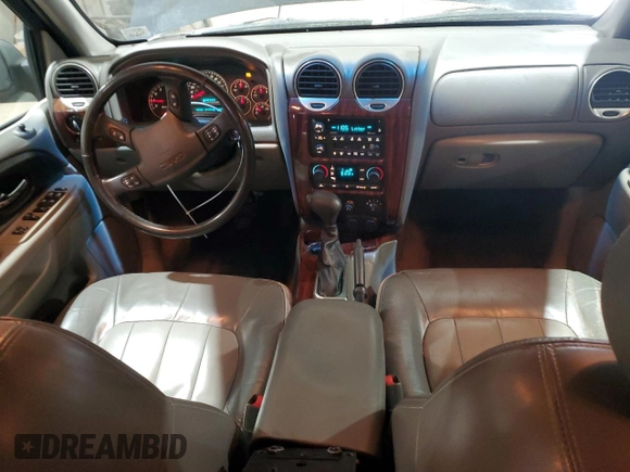 2003 GMC Envoy SLT with VIN 1GKDT13S232251871, listed as a Copart auction lot 45306785 with 174,303 mi miles and Salvage Title. Bid and sale history available at carsss.com. Image 8.