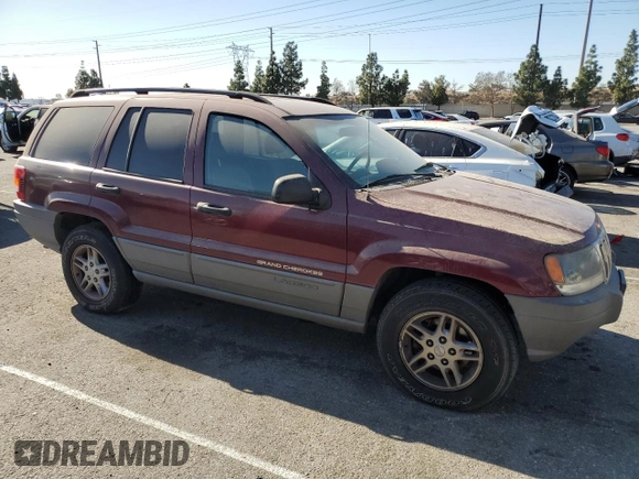 2002 Jeep Grand Cherokee Laredo with VIN 1J4GX48S52C265385, listed as a Copart auction lot 88823385 with 225,106 mi miles and Clean title. Bid and sale history available at DreamBid. Image 4.