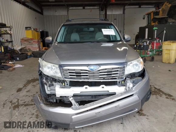 2009 Subaru Forester X with VIN JF2SH63619H731296, listed as a IAAI auction lot 42294036 with 184,739 mi miles and . Bid and sale history available at DreamBid. Image 12.