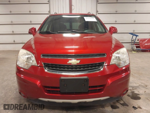 2014 Chevrolet Captiva Sport LT z VIN 3GNAL3EK2ES609279, wystawiony jako IAAI lot #42135344 z przebiegiem 46 330 mil mil oraz . Historia ofert i sprzedaży dostępna na DreamBid. Obrazek 13.