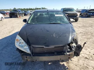 2006 Pontiac G6 GTP z VIN 1G2ZM551864130947, wystawiony jako Copart lot #81133504 z przebiegiem Nie podano mil oraz Szkoda całkowita • Salvage title. Historia ofert i sprzedaży dostępna na DreamBid. Obrazek 5.