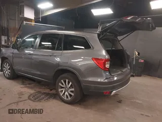 2019 Honda Pilot EX-L with VIN 5FNYF6H57KB062293, listed as a IAAI auction lot 41936964 with 93,012 mi miles and . Bid and sale history available at DreamBid. Image 3.