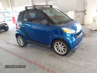 2008 Smart fortwo Pure with VIN WMEEJ31X28K123879, listed as a IAAI auction lot 42258663 with 93,056 mi miles and . Bid and sale history available at DreamBid. Image 1.