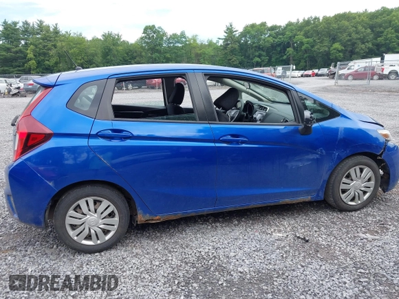2015 Honda Fit LX with VIN 3HGGK5G59FM711808, listed as a IAAI auction lot 42655848 with 169,780 mi miles and . Bid and sale history available at DreamBid. Image 13.