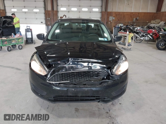 2018 Ford Focus SE with VIN 1FADP3FE8JL209560, listed as a IAAI auction lot 42707236 with 166,017 mi miles and . Bid and sale history available at DreamBid. Image 6.