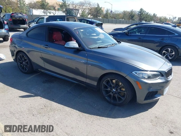 2014 BMW 2 Series M235i with VIN WBA1J7C51EVX33702, listed as a IAAI auction lot 41713337 with 83,076 mi miles. Bid and sale history available at carsss.com. Image 1.