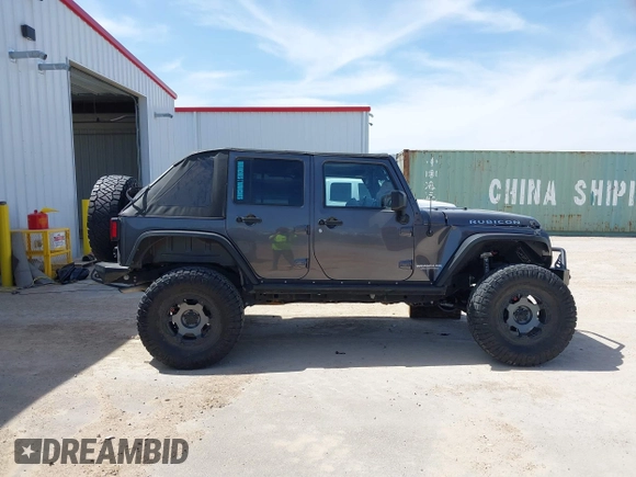 2014 Jeep Wrangler Unlimited Rubicon с VIN 1C4BJWFG2EL279938, выставлен на аукционе IAAI как лот 41920729 с пробегом 76 418 миль миль и . История ставок и продаж доступна на DreamBid. Изображение 14.