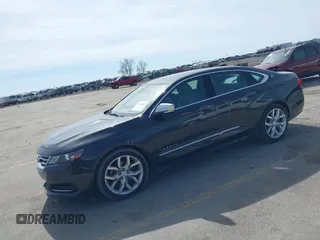 2015 Chevrolet Impala LTZ with VIN 1G1165S39FU138640, listed as a IAAI auction lot 41780288 with 145,000 mi miles and . Bid and sale history available at DreamBid. Image 2.