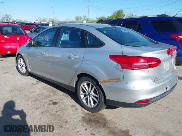 2016 Ford Focus SE with VIN 1FADP3F28GL389377, listed as a IAAI auction lot 42135996 with 172,278 mi miles. Bid and sale history available at carsss.com. Image 3.