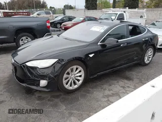 2016 Tesla Model S 70 with VIN 5YJSA1E1XGF154577, listed as a IAAI auction lot 41778697 with 62,630 mi miles and . Bid and sale history available at DreamBid. Image 2.