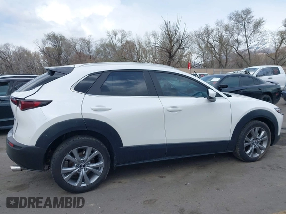 2023 Mazda CX-30 S Carbon Edition with VIN 3MVDMBCM8PM560726, listed as a IAAI auction lot 41949740 with 35,164 mi miles and . Bid and sale history available at carsss.com. Image 13.