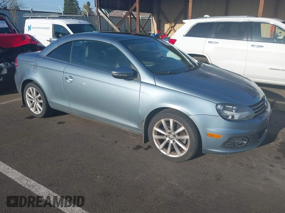2012 Volkswagen Eos Komfort with VIN WVWBW7AH1CV022066, listed as a IAAI auction lot 41950391 with 98,877 mi miles and . Bid and sale history available at DreamBid. Image 1.