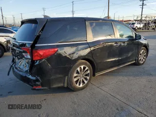 2023 Honda Odyssey EX-L with VIN 5FNRL6H66PB060032, listed as a Copart auction lot 83077304 with 15,169 mi miles and Salvage Title. Bid and sale history available at carsss.com. Image 3.