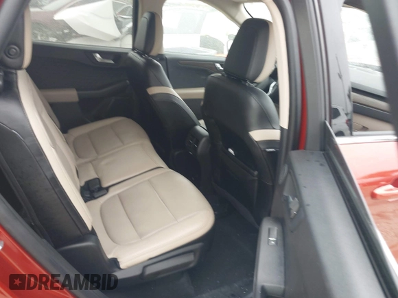 2020 Ford Escape Titanium Hybrid with VIN 1FMCU0DZ1LUB13684, listed as a IAAI auction lot 41629782 with 31,669 mi miles and . Bid and sale history available at DreamBid. Image 8.