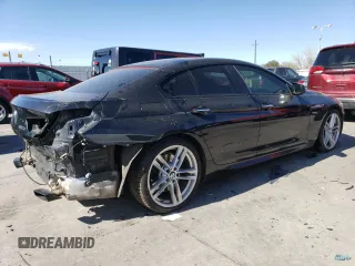 2015 BMW 6 Series 650i xDrive with VIN WBA6B4C55FD761124, listed as a Copart auction lot 50559555 with 49,735 mi miles and Salvage Title. Bid and sale history available at DreamBid. Image 3.